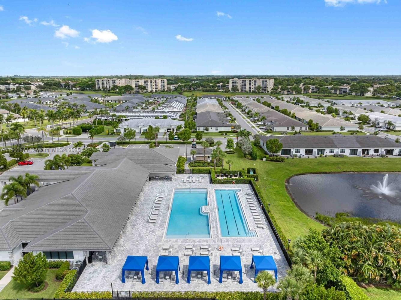 14502 Sloan Rdg Drive, Unit LUMINOSA Delray Beach, FL 33446 - Photo 16 of 49 an aerial view of multiple houses with a swimming pool
