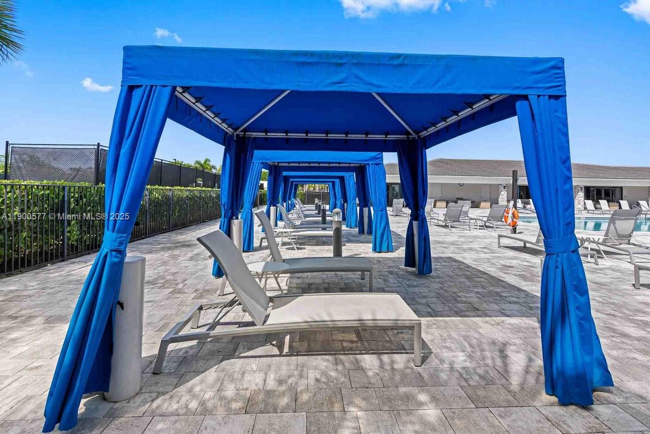 14502 Sloan Rdg Drive, Unit LUMINOSA Delray Beach, FL 33446 - Photo 17 of 49 a view of a porch with a patio