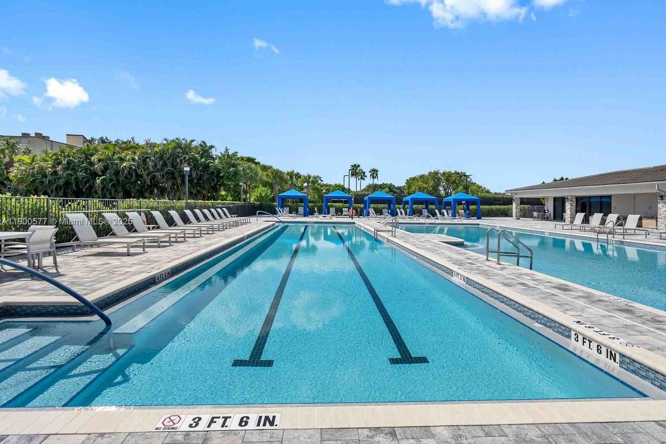 14502 Sloan Rdg Drive, Unit LUMINOSA Delray Beach, FL 33446 - Photo 18 of 49 a view of swimming pool with lounge chair