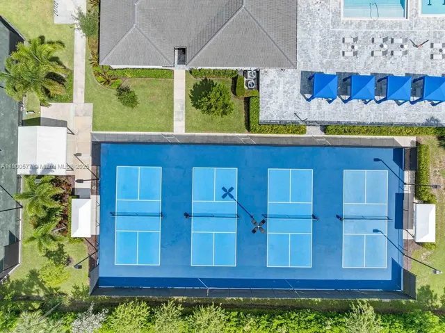 a view of a window of the house with a yard