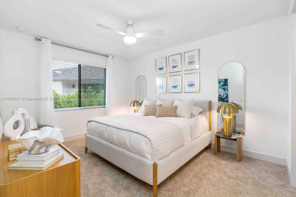 14502 Sloan Rdg Drive, Unit LUMINOSA Delray Beach, FL 33446 - Photo 32 of 49 a bedroom with a bed and a window