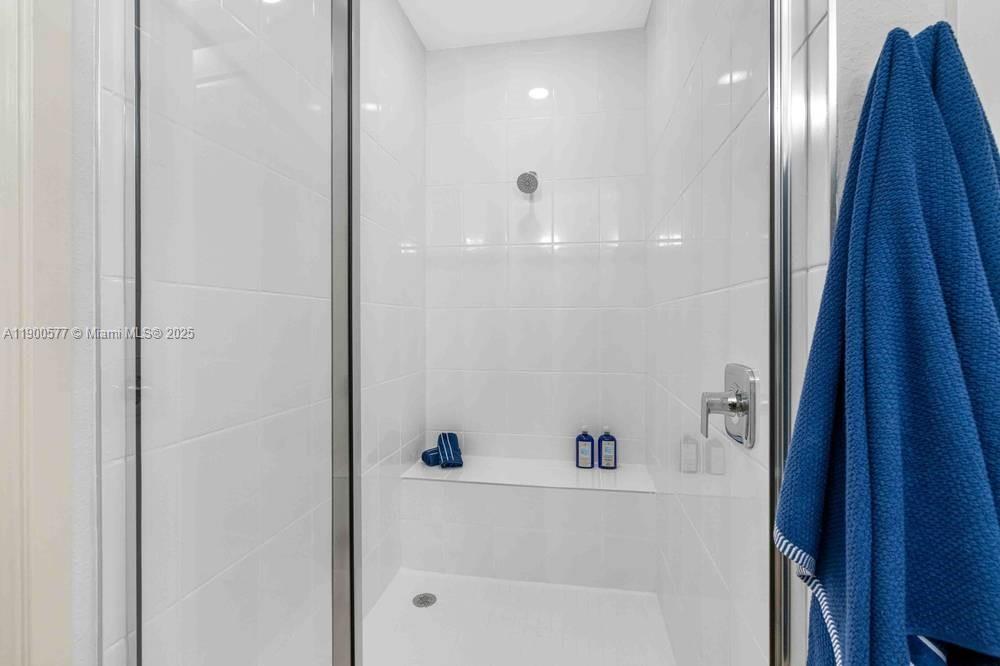 14502 Sloan Rdg Drive, Unit LUMINOSA Delray Beach, FL 33446 - Photo 33 of 49 a bathroom with a bathtub