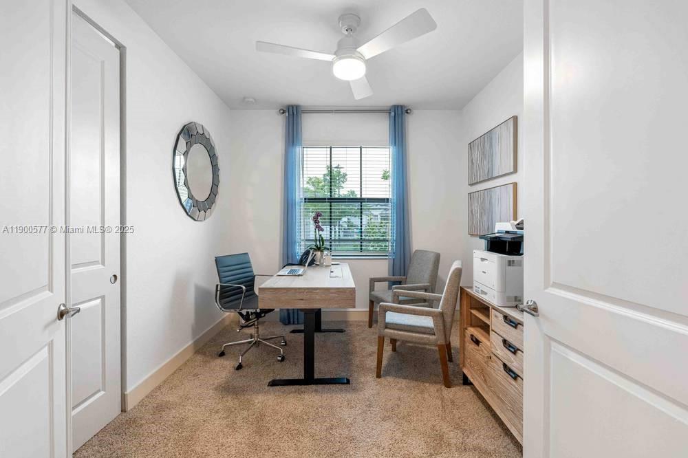 14502 Sloan Rdg Drive, Unit LUMINOSA Delray Beach, FL 33446 - Photo 36 of 49 a view of a workspace with furniture and a window