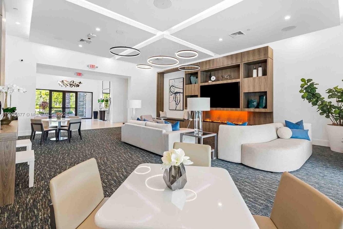 14502 Sloan Rdg Drive, Unit LUMINOSA Delray Beach, FL 33446 - Photo 7 of 49 a living room with furniture kitchen view and a large window