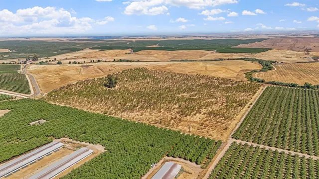 a view of an outdoor space and tennis court