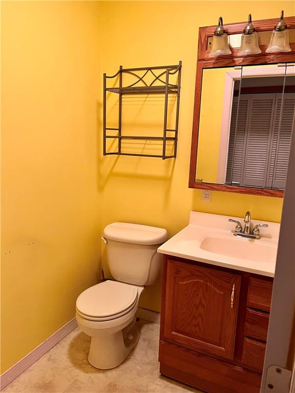 312 Zero Street Carnegie, PA 15106 - Photo 14 of 22 a bathroom with a toilet sink and mirror