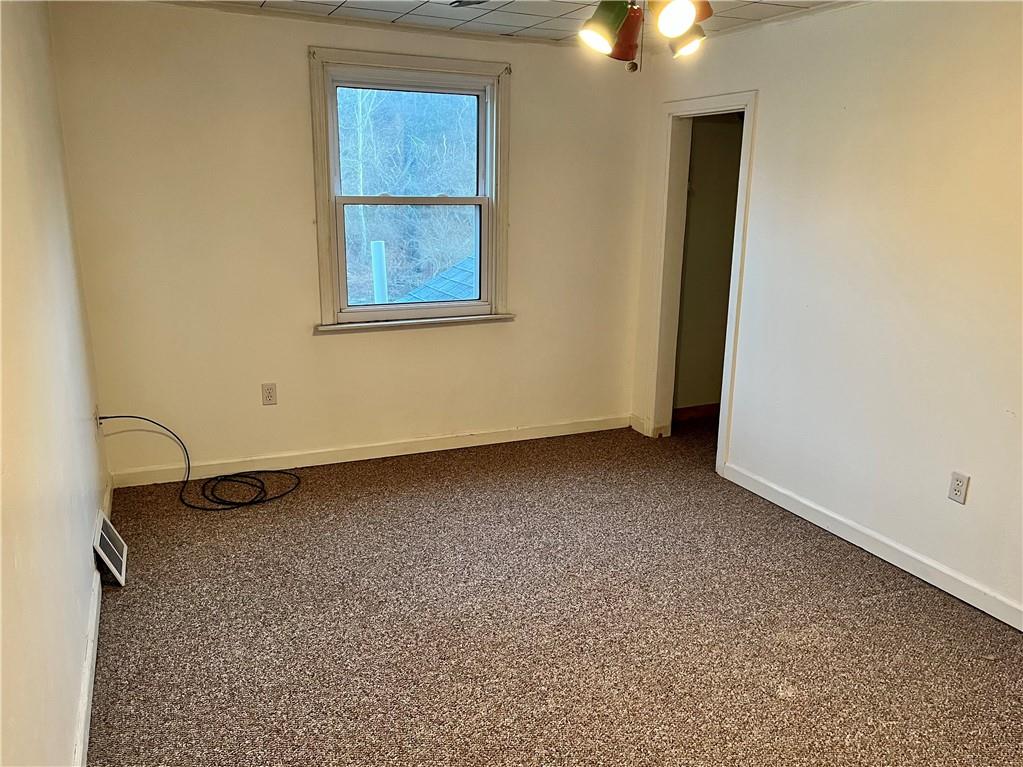 312 Zero Street Carnegie, PA 15106 - Photo 16 of 22 an empty room with a window