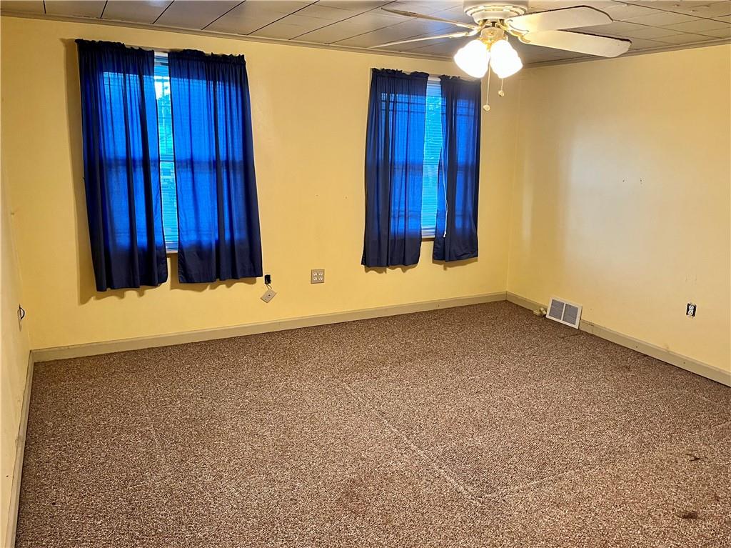 312 Zero Street Carnegie, PA 15106 - Photo 17 of 22 a view of a room with wooden walls and window