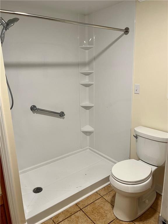 312 Zero Street Carnegie, PA 15106 - Photo 10 of 22 a bathroom with a shower and a toilet