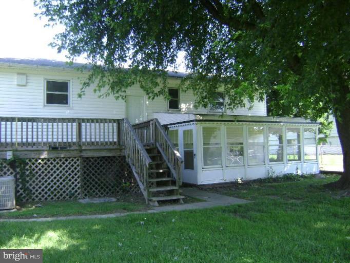 3107 Grace Road Sparrows Point, MD 21219 - Photo 2 of 7 a view of a house with a backyard