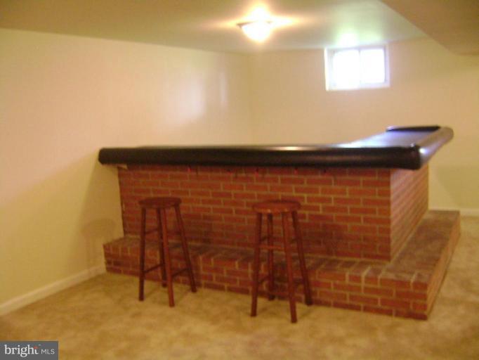3107 Grace Road Sparrows Point, MD 21219 - Photo 6 of 7 a view of wooden floor with a table and chairs