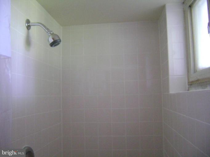 3107 Grace Road Sparrows Point, MD 21219 - Photo 7 of 7 a bathroom with a shower