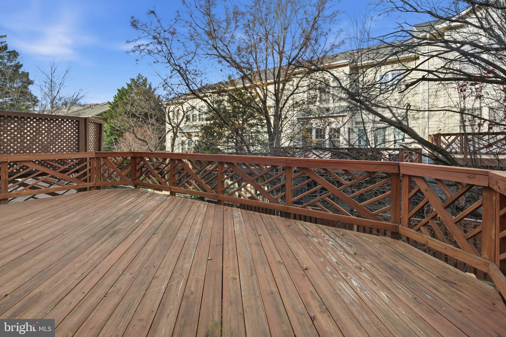 8026 Kidwell Hill Court Vienna, VA 22182 - Photo 21 of 22 a street sign on a wooden floor