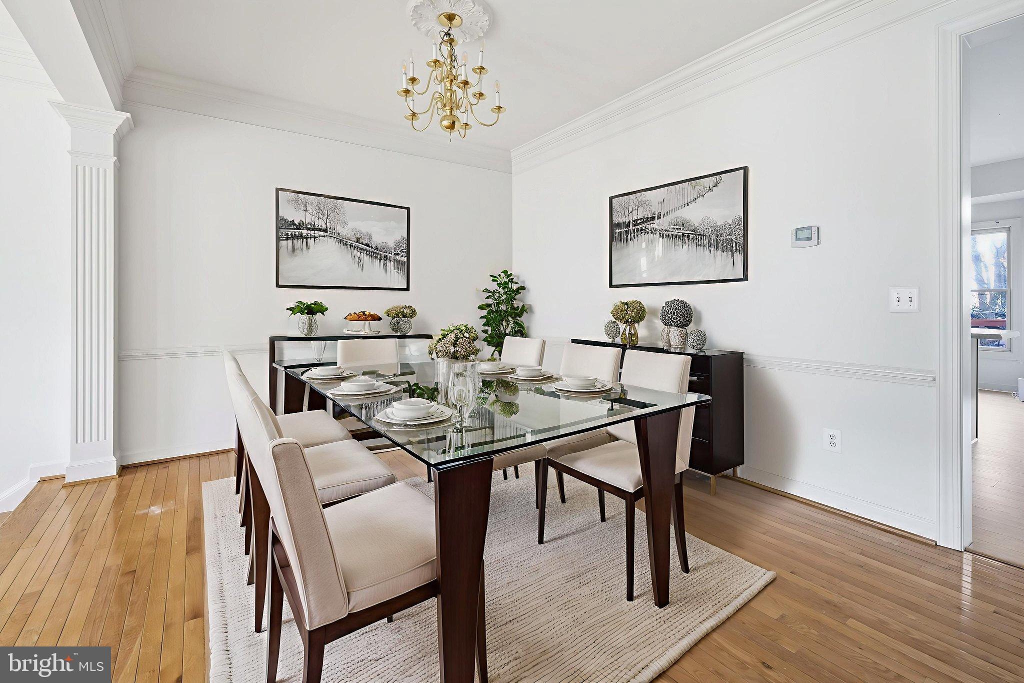8026 Kidwell Hill Court Vienna, VA 22182 - Photo 5 of 22 a view of a dining room with furniture and wooden floor