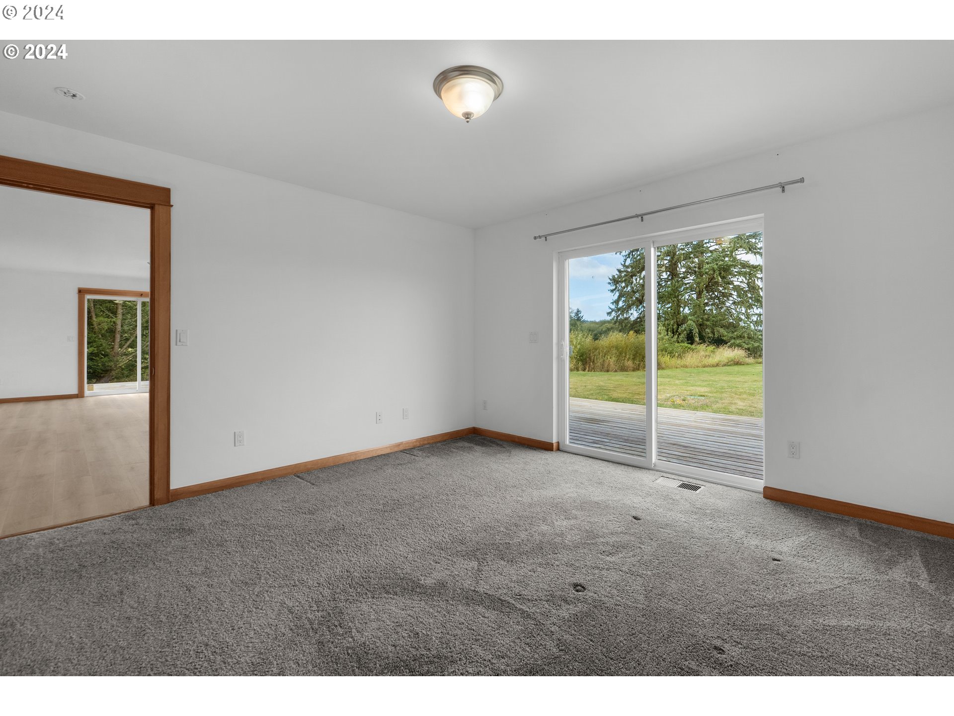 90713 Fort Clatsop Road Astoria, OR 97103 - Photo 13 of 30 a view of an empty room with a window