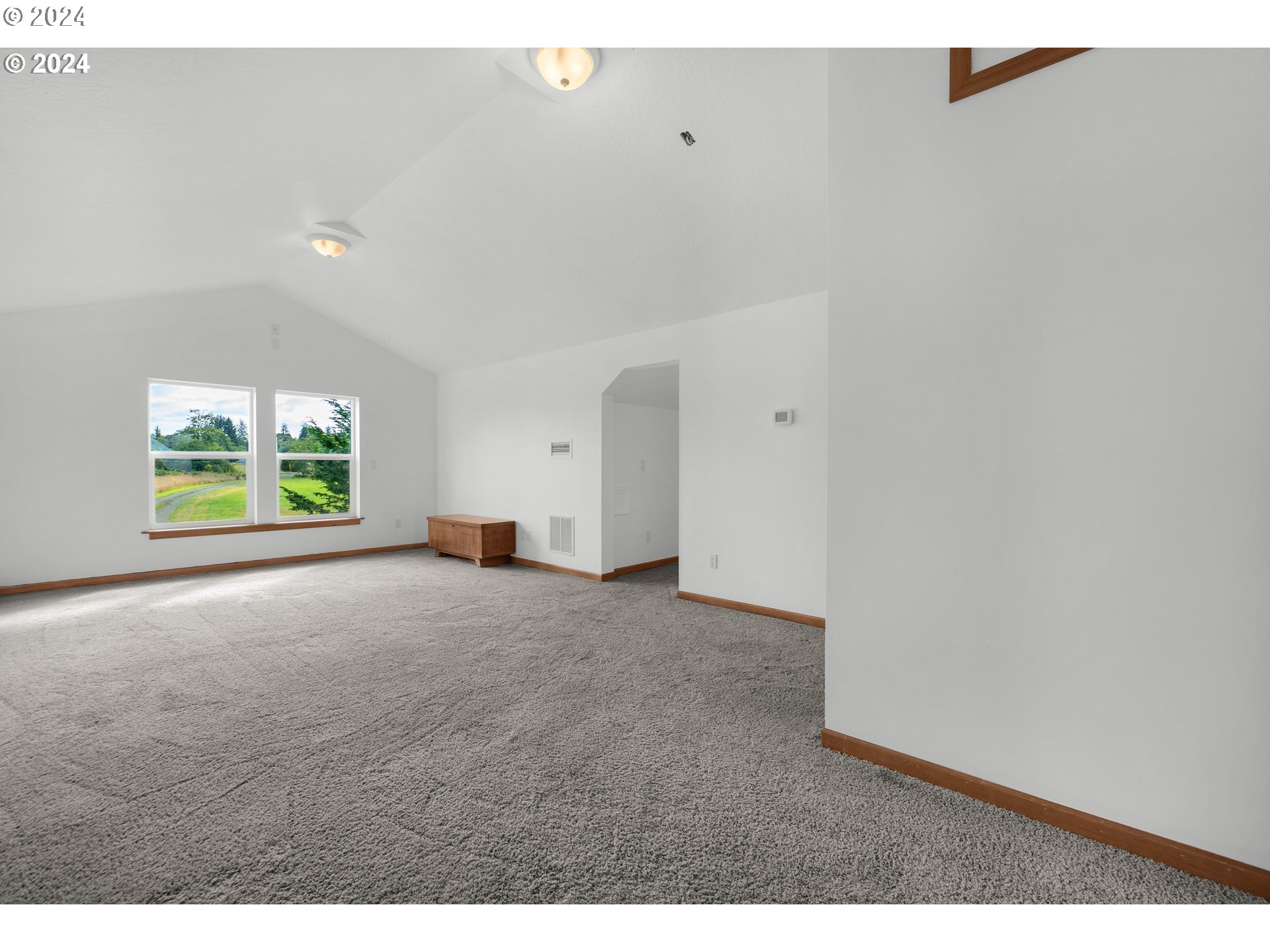 90713 Fort Clatsop Road Astoria, OR 97103 - Photo 18 of 30 a view of an empty room with a window