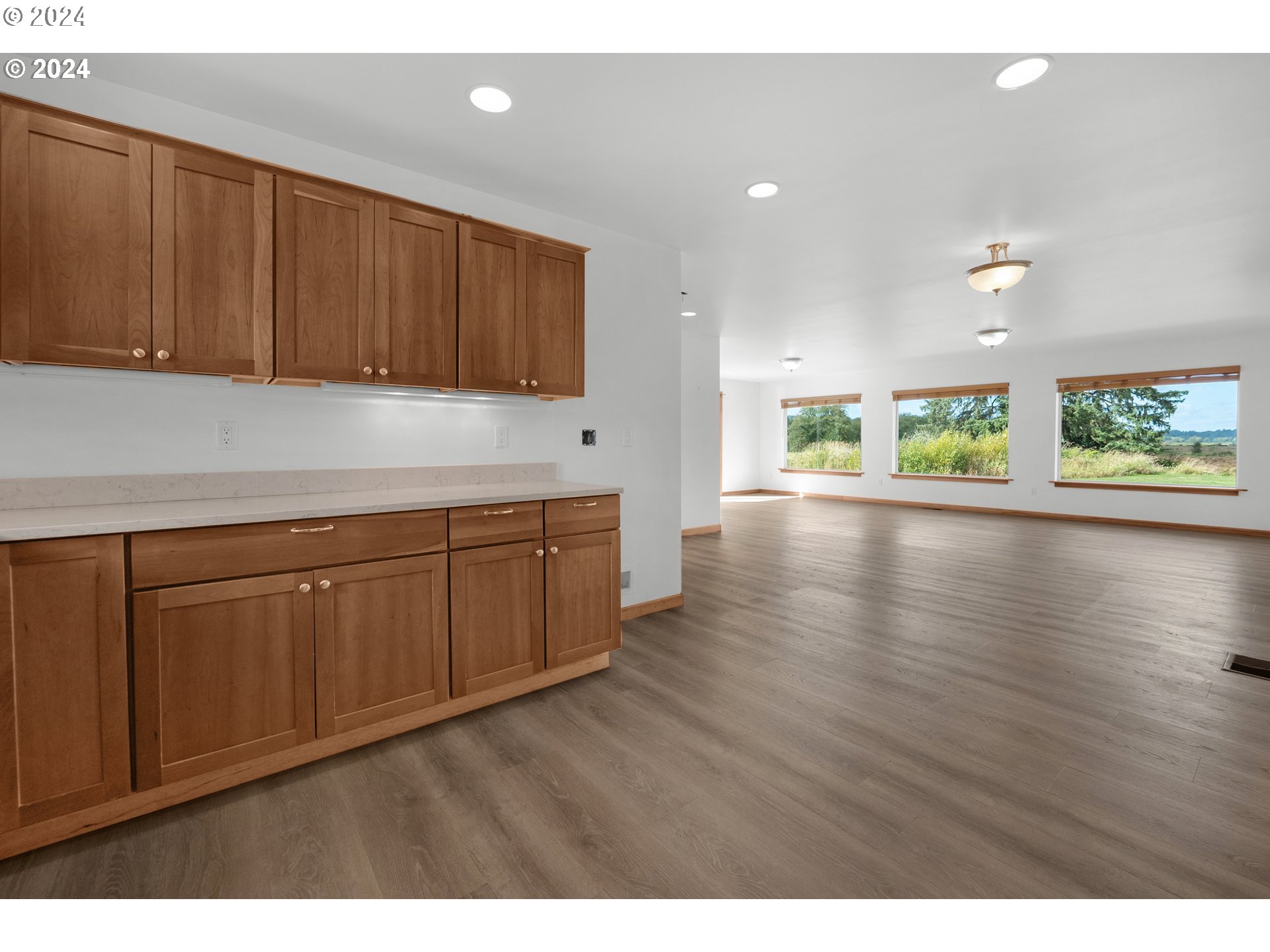 90713 Fort Clatsop Road Astoria, OR 97103 - Photo 10 of 30 a kitchen with wooden cabinets
