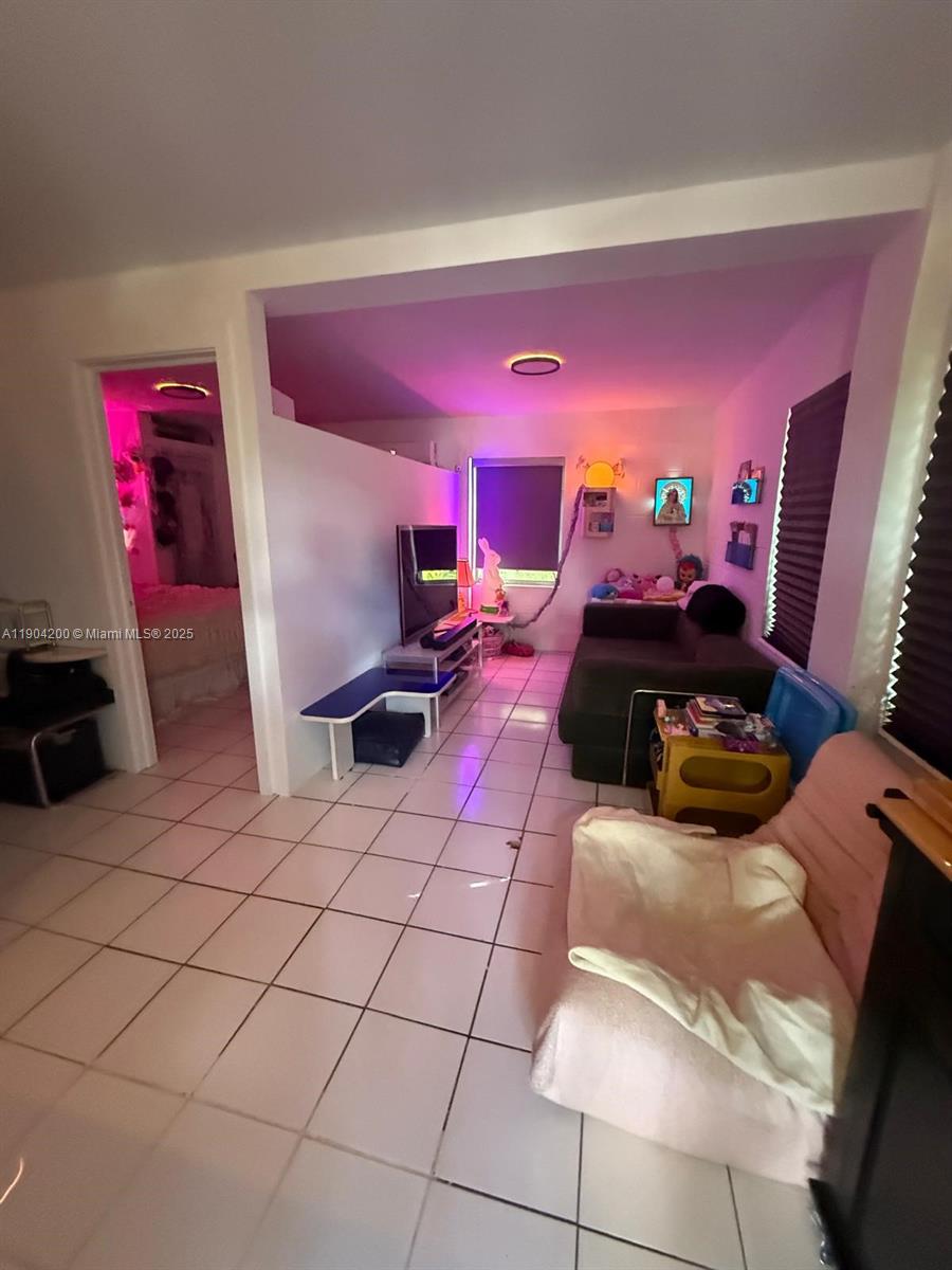 a bed room with a bed and a couch