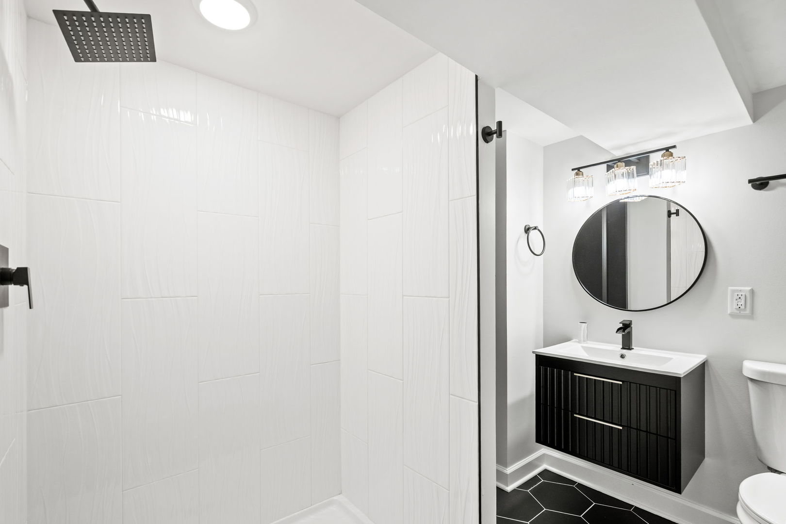 6444 28th Place Berwyn, IL 60402 - Photo 19 of 24 a bathroom with a sink and a mirror