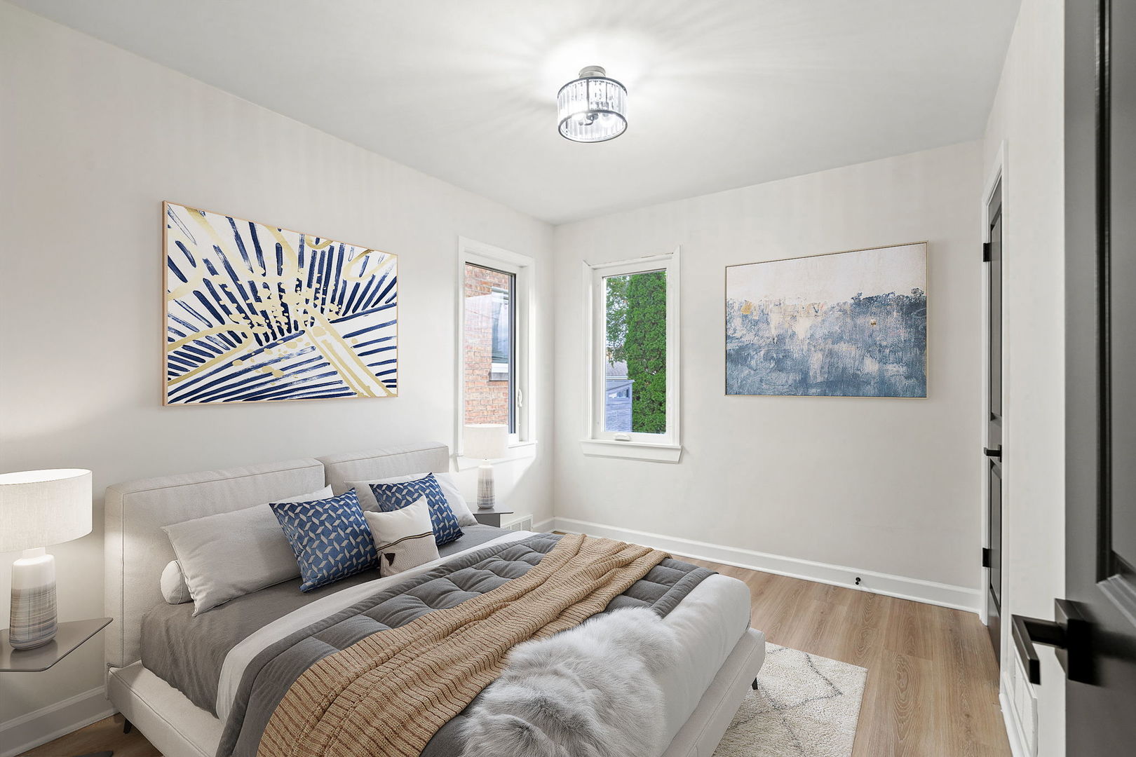 6444 28th Place Berwyn, IL 60402 - Photo 9 of 24 a bedroom with a bed and a painting on the wall