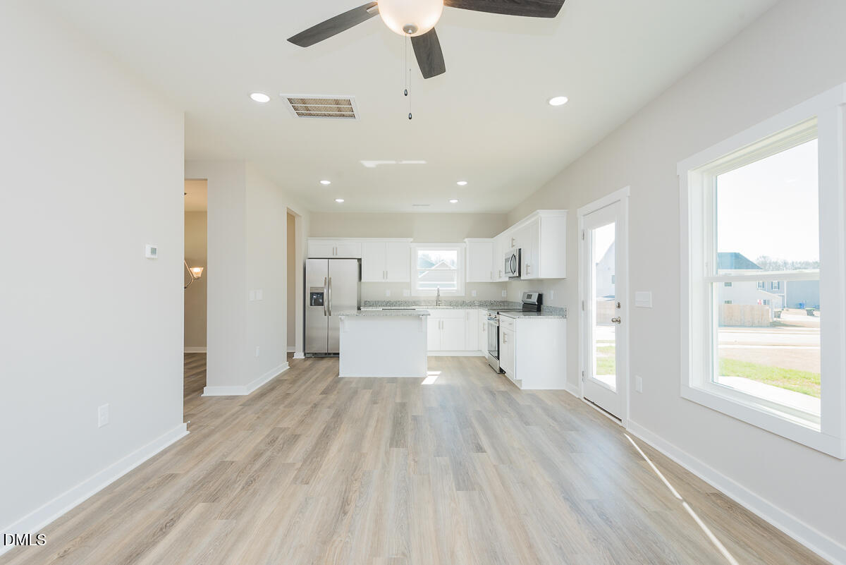 1125 Scarlet Oak Rd Spring Spring Hope, NC 27882 - Photo 16 of 29 a view of kitchen with wooden floor