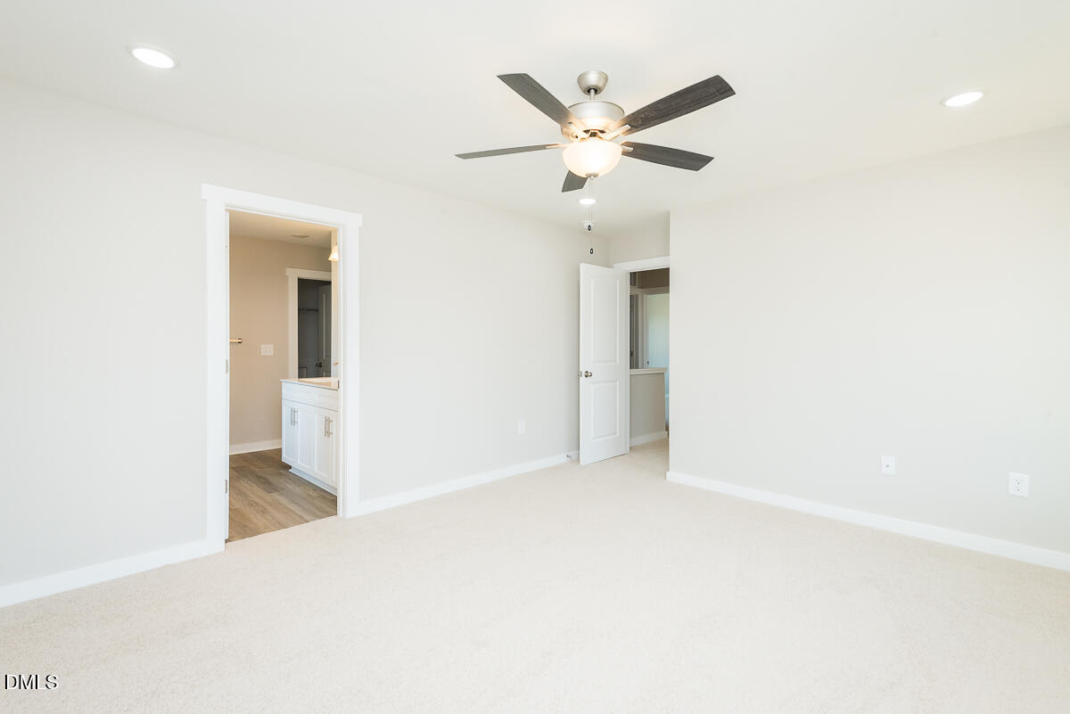 1125 Scarlet Oak Rd Spring Spring Hope, NC 27882 - Photo 23 of 29 a view of a livingroom with a ceiling fan