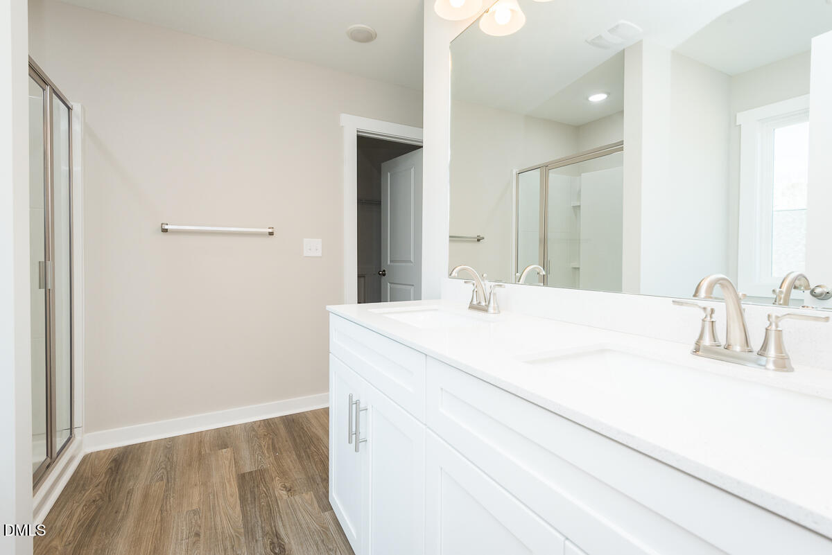 1125 Scarlet Oak Rd Spring Spring Hope, NC 27882 - Photo 24 of 29 a bathroom with a sink and a mirror