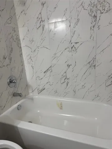 a bathroom with a bathtub