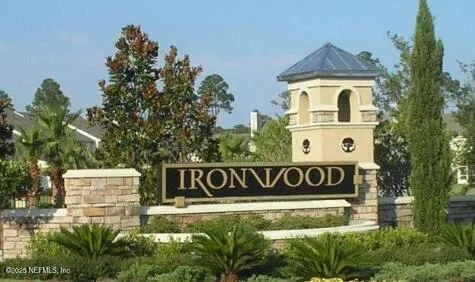 a front view of a house with garage