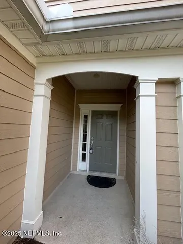 a kitchen with a sink and a refrigerator