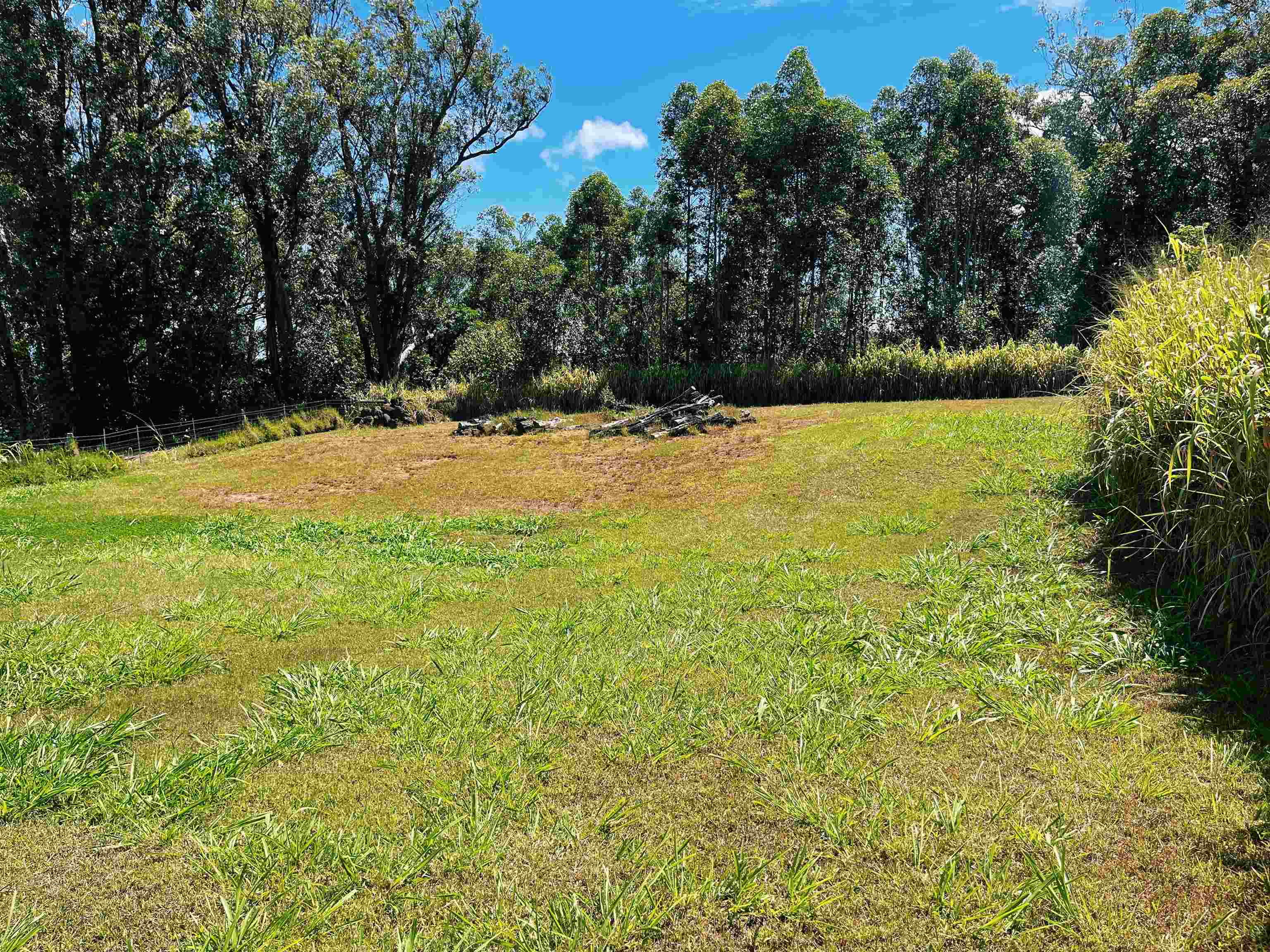 57 Awalau Road, Unit A Haiku, HI 96708 - Photo 15 of 22 a view of an outdoor space and a yard