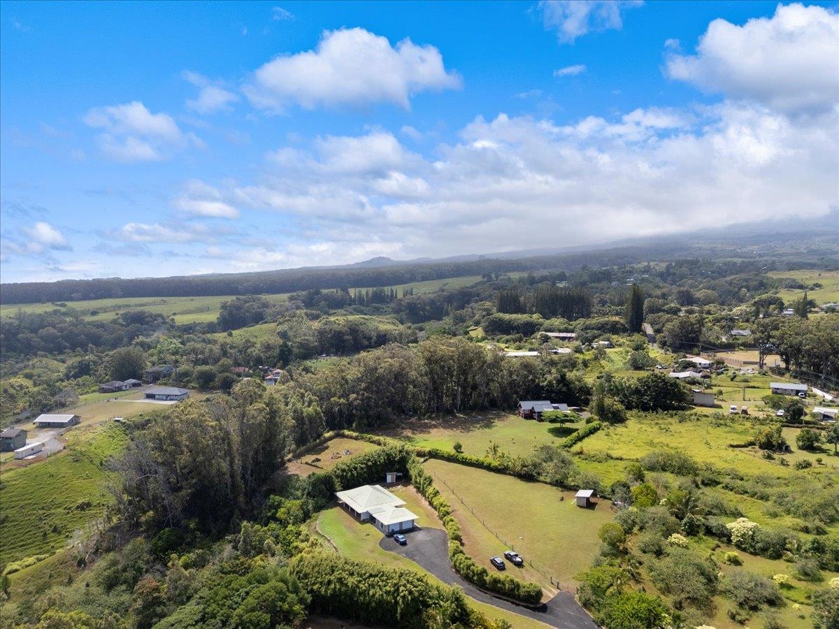 57 Awalau Road, Unit A Haiku, HI 96708 - Photo 18 of 22 an aerial view of residential house with outdoor space