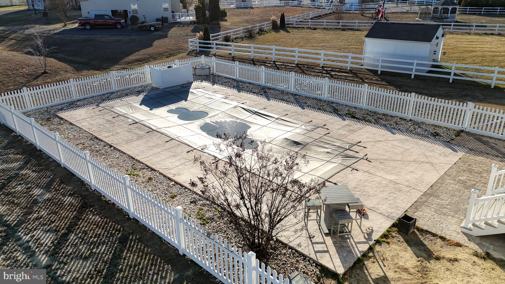 24875 Rivers Edge Road Millsboro, DE 19966 - Photo 15 of 48 a view of a backyard with sitting area