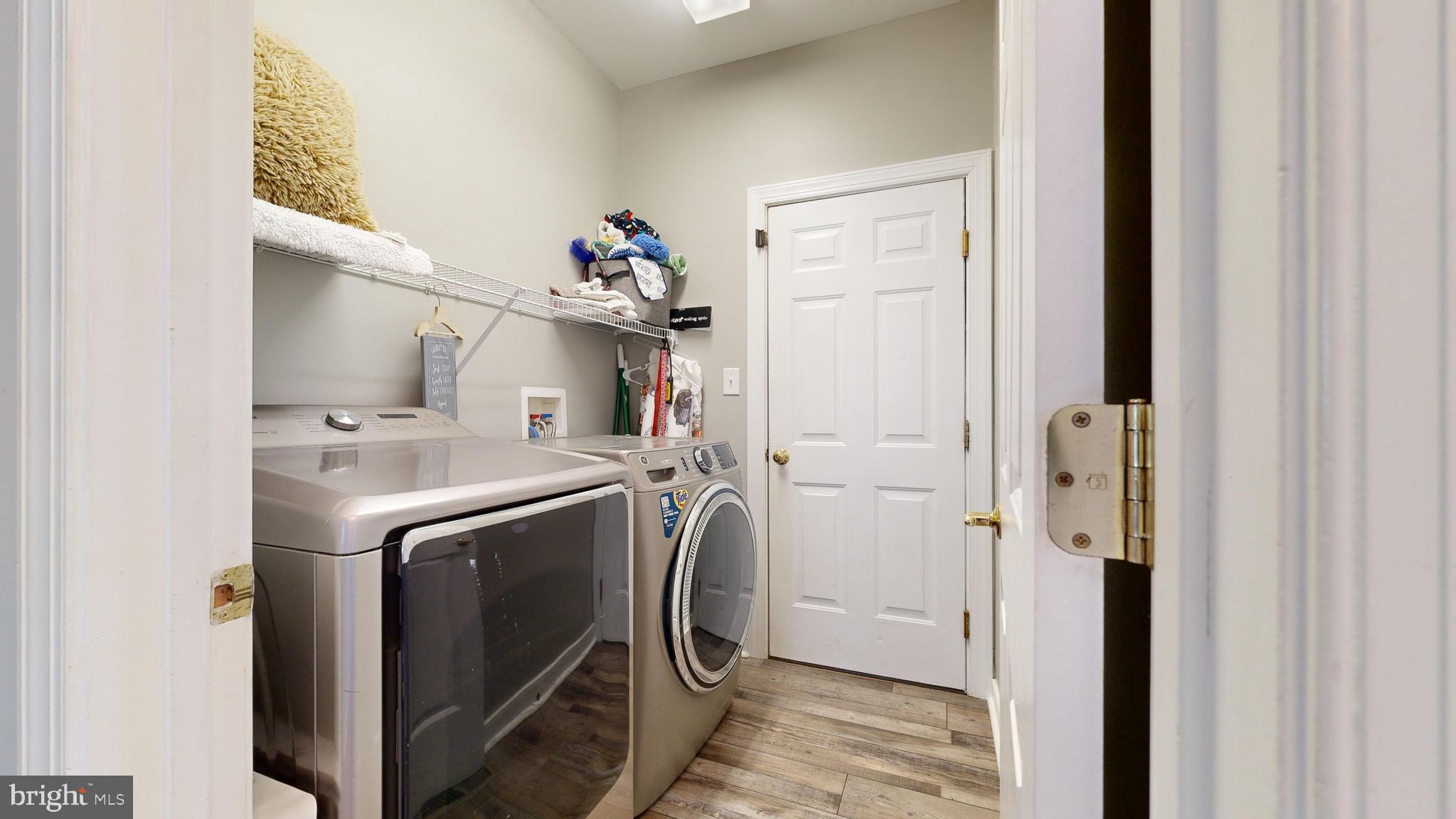 24875 Rivers Edge Road Millsboro, DE 19966 - Photo 26 of 48 a utility room with dryer and washer