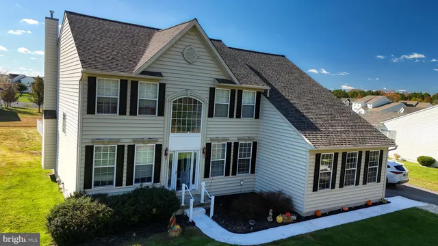 a lake view with couple of trees