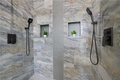 a bathroom with a sink and cabinets