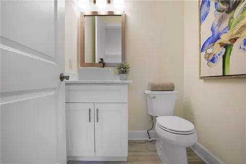 a front view of house with backyard