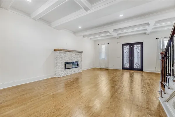 a living room with furniture and a table