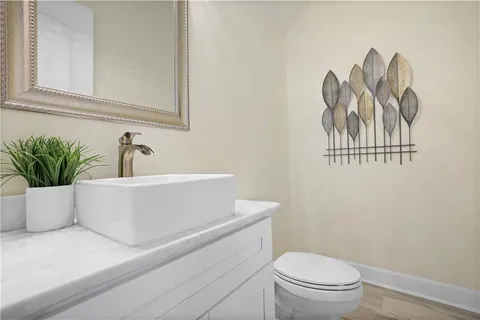 a bathroom with a toilet and a sink