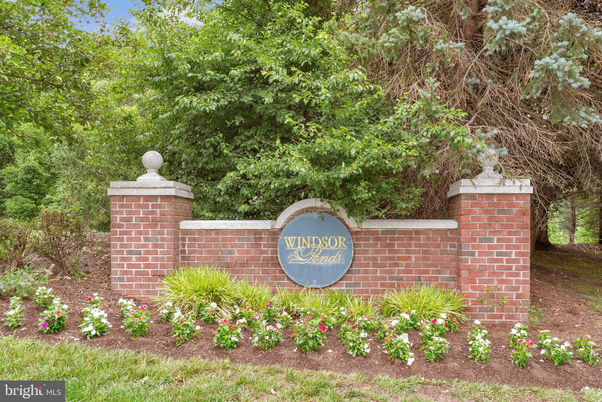 16 Cardiff Court Princeton Junction, NJ 08550 - Photo 48 of 60 a front view of a house with garden