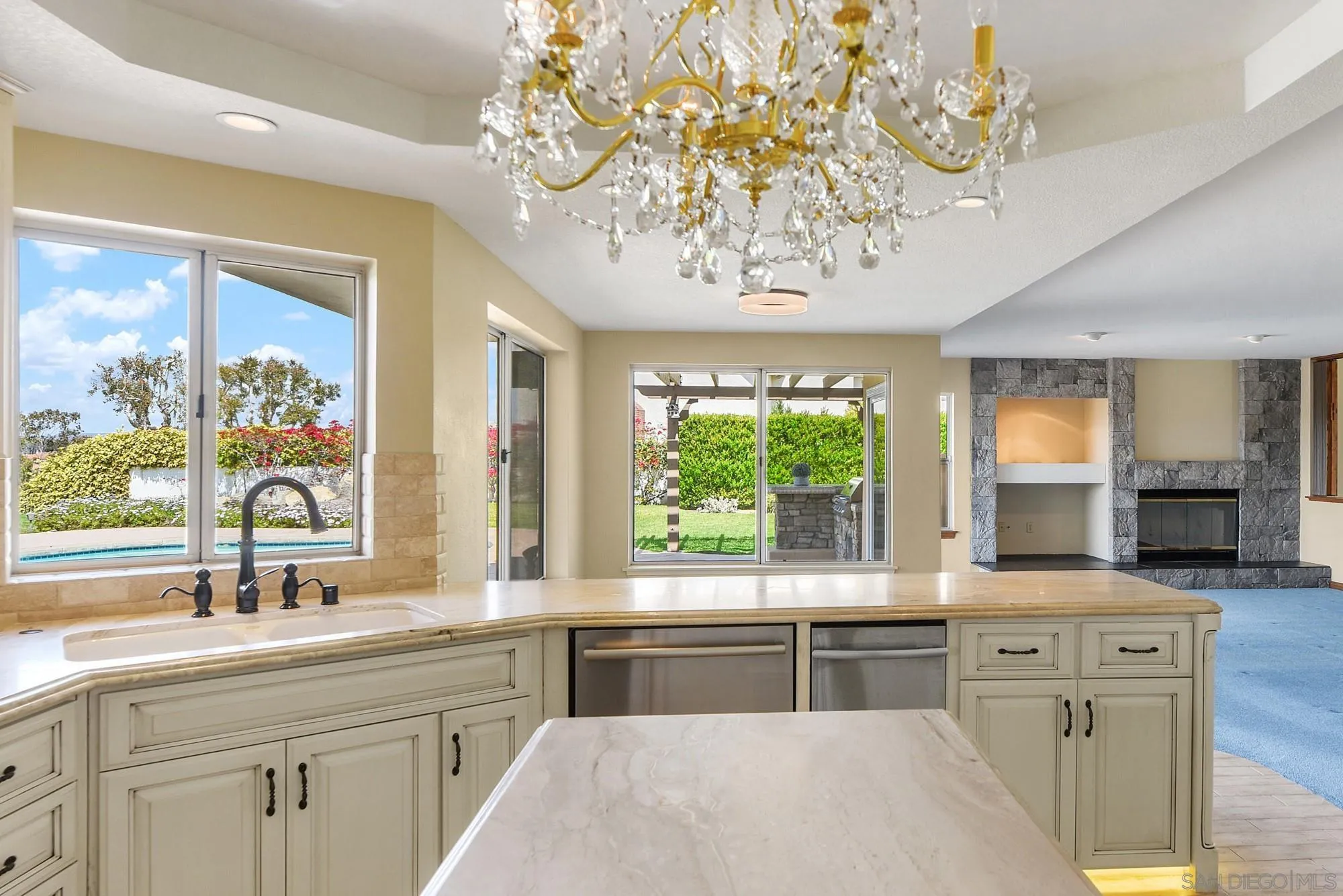 13000 Lomas Verdes Drive Poway, CA 92064 - Photo 15 of 58 a large kitchen with a large window