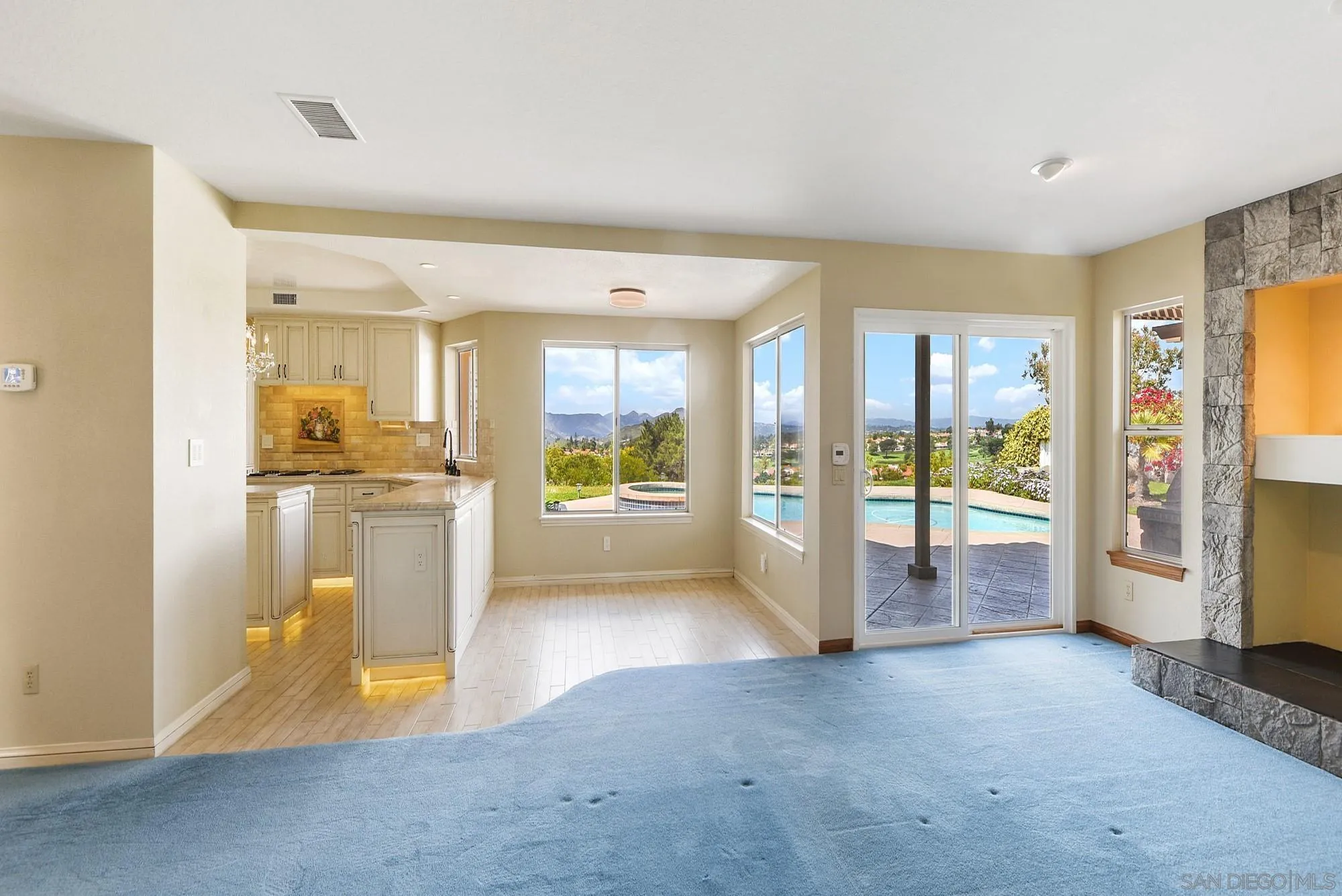13000 Lomas Verdes Drive Poway, CA 92064 - Photo 19 of 58 a view of a big room with windows and kitchen view