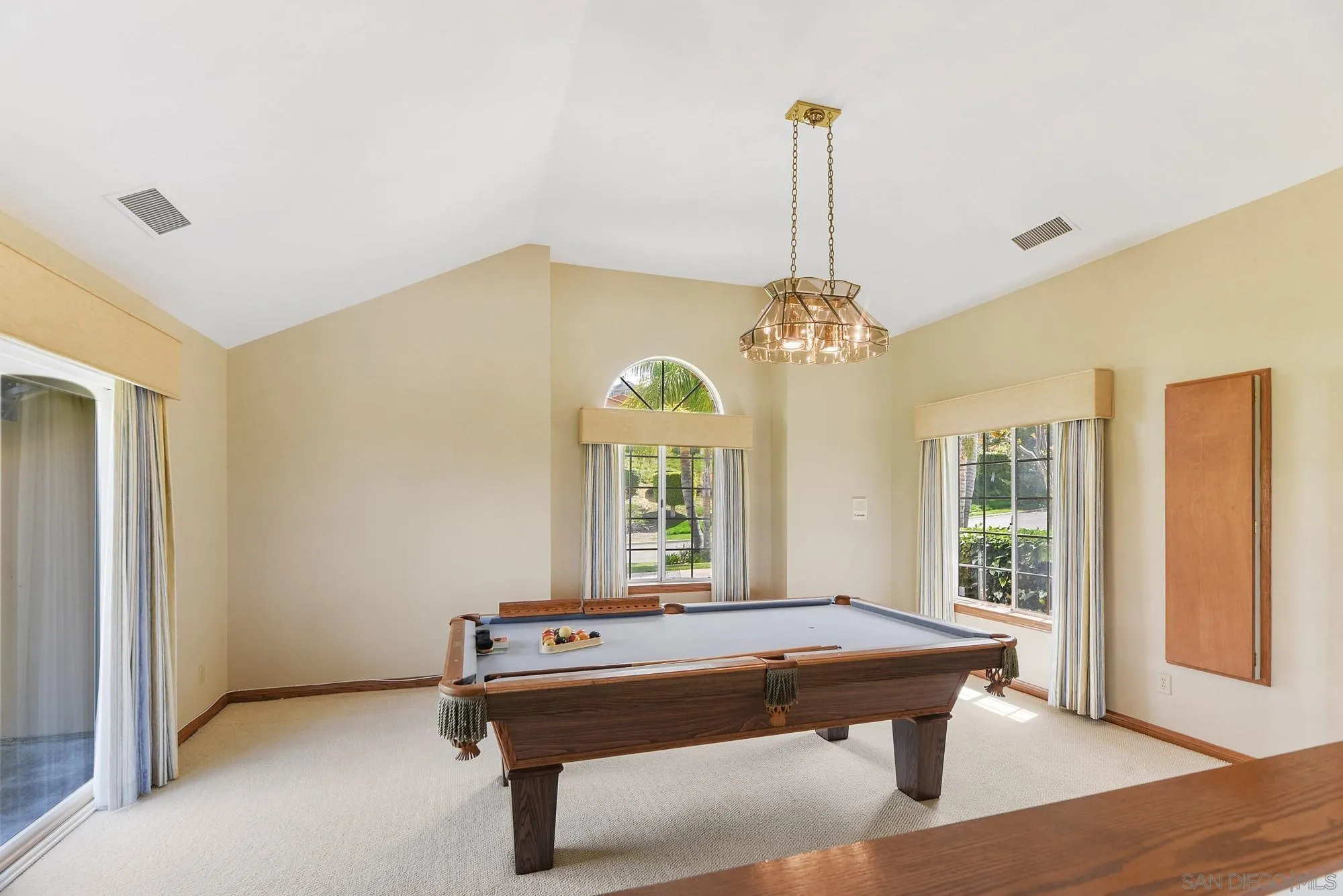 13000 Lomas Verdes Drive Poway, CA 92064 - Photo 20 of 58 a living room with couch table and a window