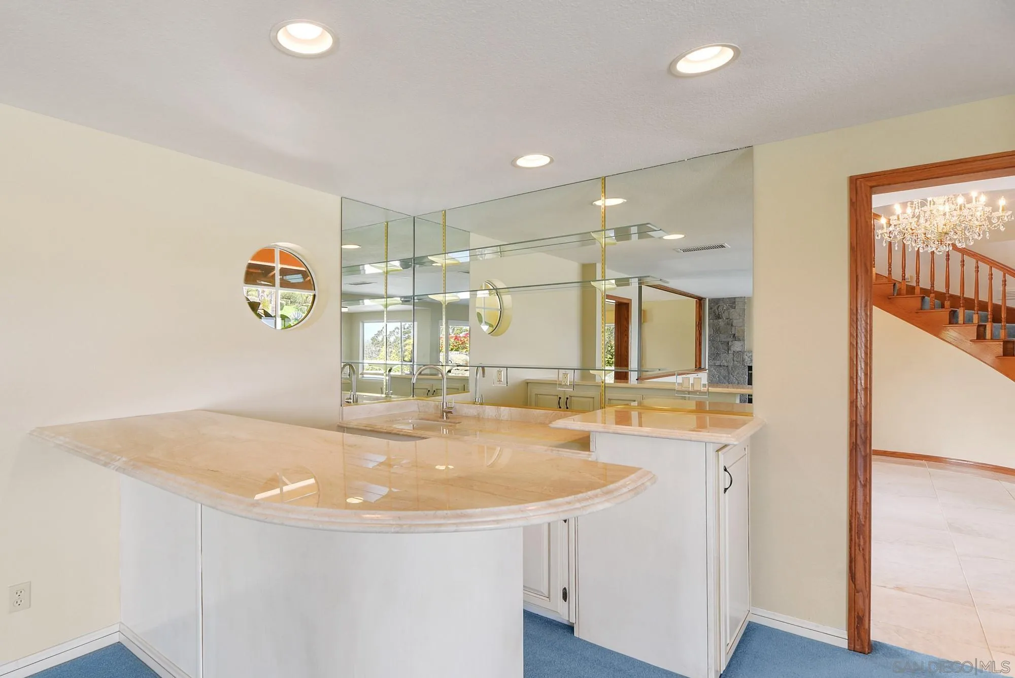 13000 Lomas Verdes Drive Poway, CA 92064 - Photo 23 of 58 a bathroom with a sink a mirror and a bathtub