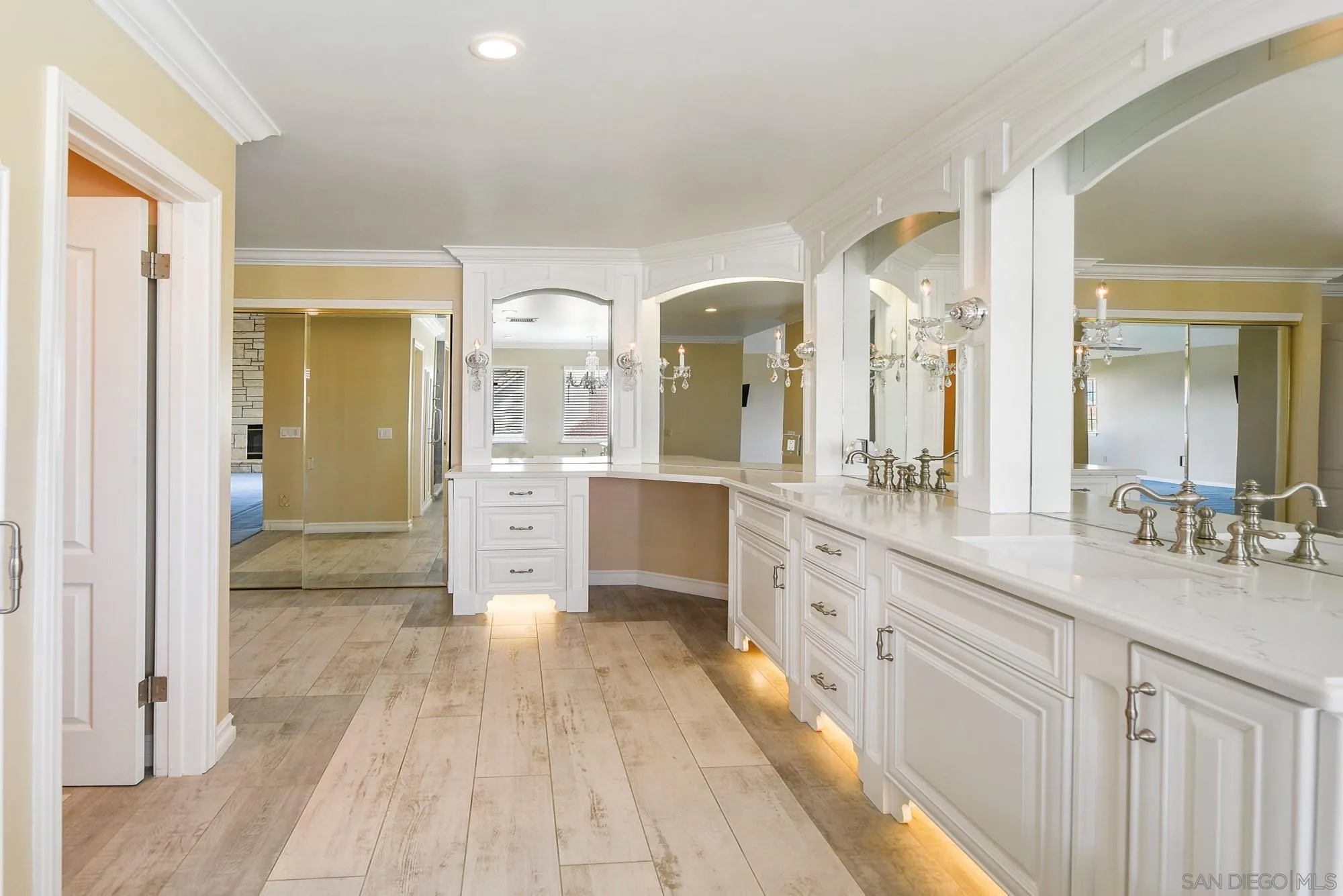 13000 Lomas Verdes Drive Poway, CA 92064 - Photo 37 of 58 a large bathroom with a double vanity sink and a mirror