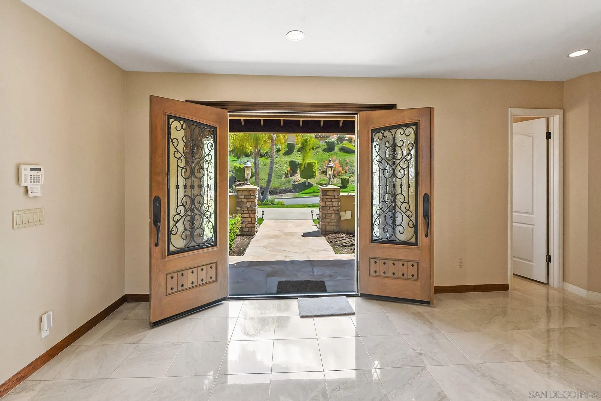 13000 Lomas Verdes Drive Poway, CA 92064 - Photo 4 of 58 wooden floor in an empty room with a fireplace