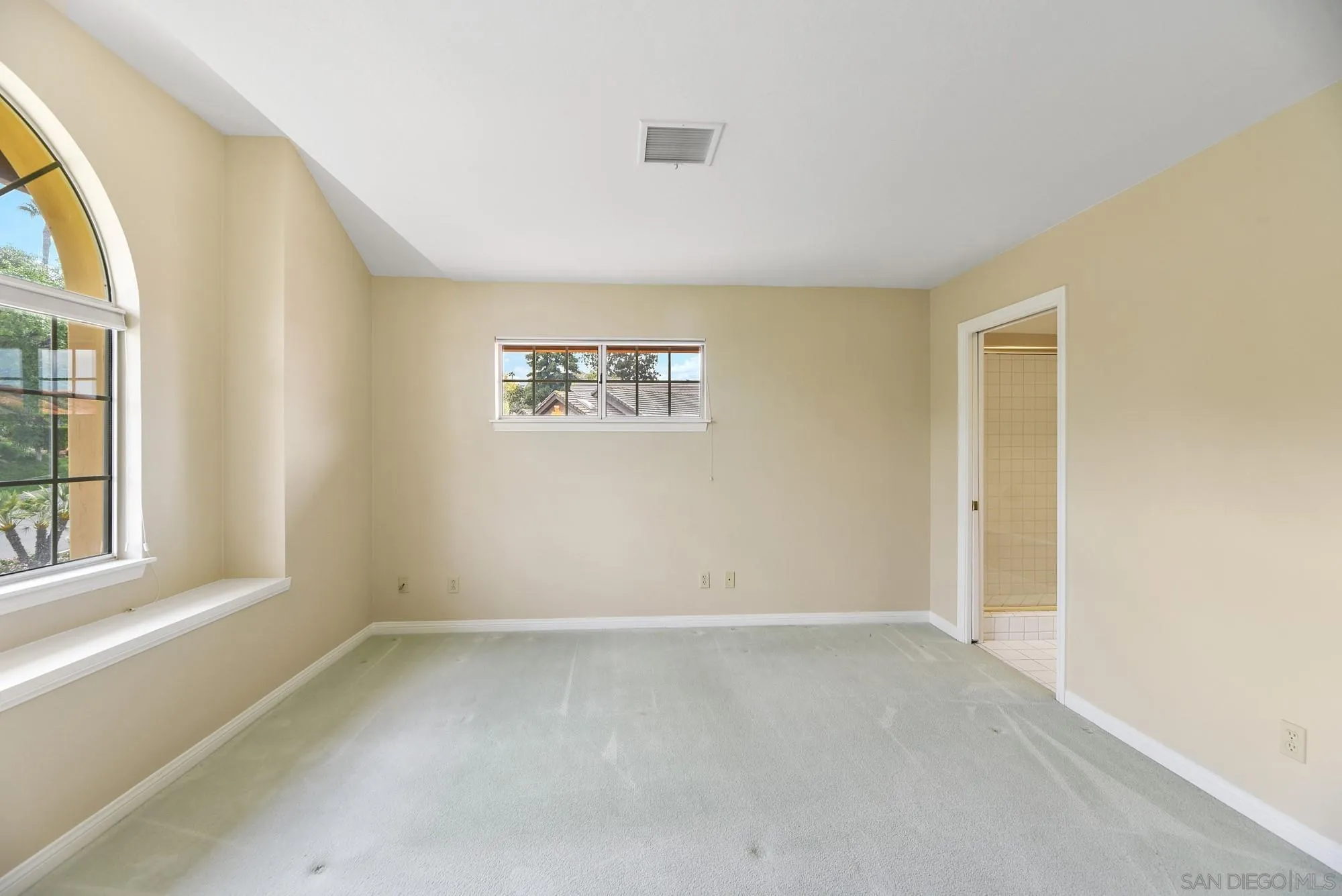 13000 Lomas Verdes Drive Poway, CA 92064 - Photo 43 of 58 an empty room with windows