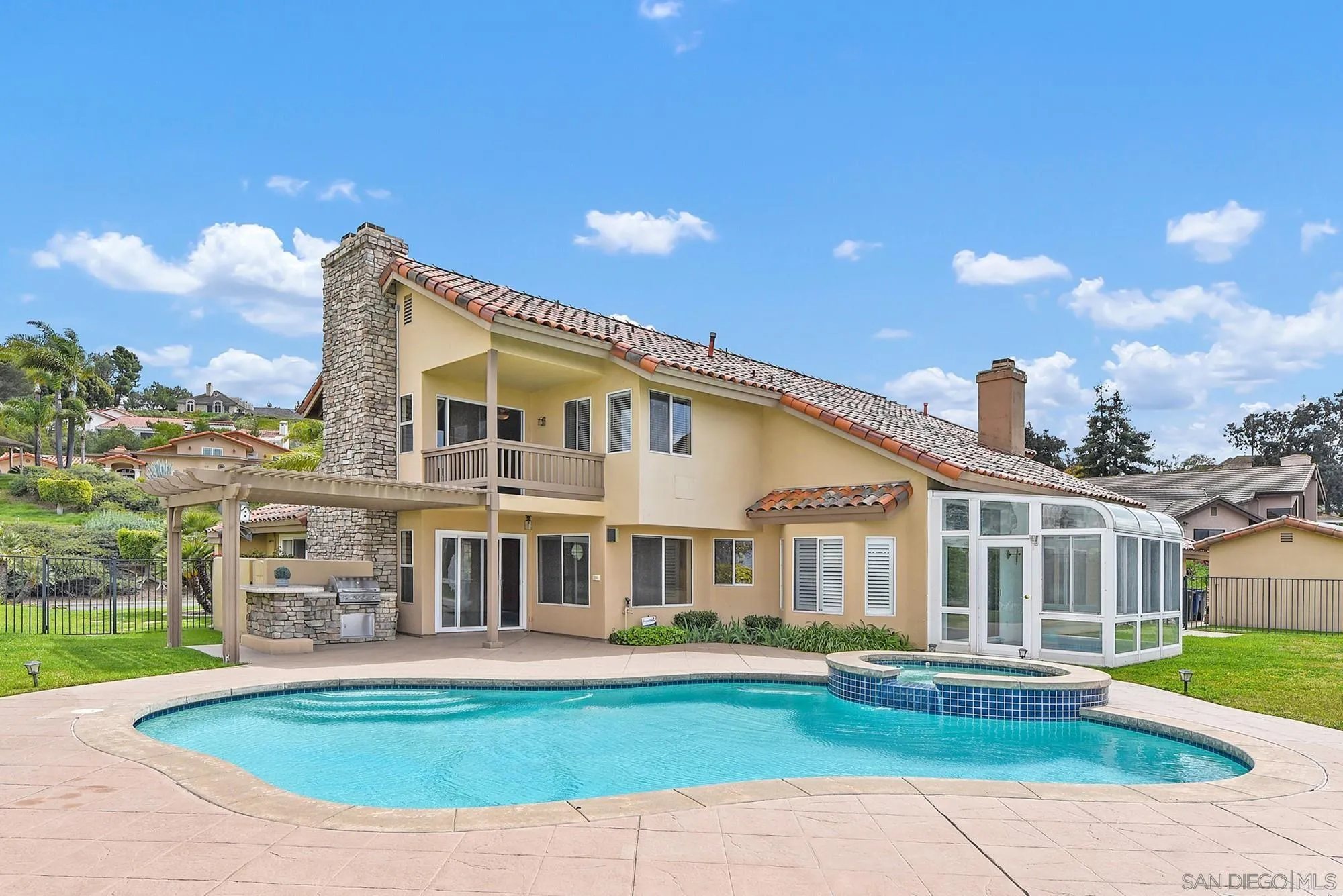 13000 Lomas Verdes Drive Poway, CA 92064 - Photo 48 of 58 a front view of a house with swimming pool having outdoor seating