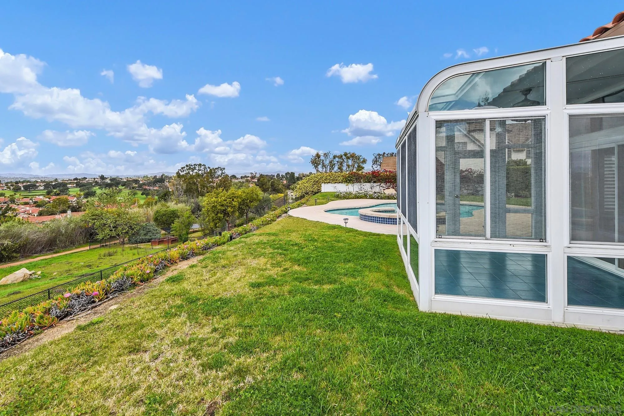 13000 Lomas Verdes Drive Poway, CA 92064 - Photo 49 of 58 a view of green field with house in the background