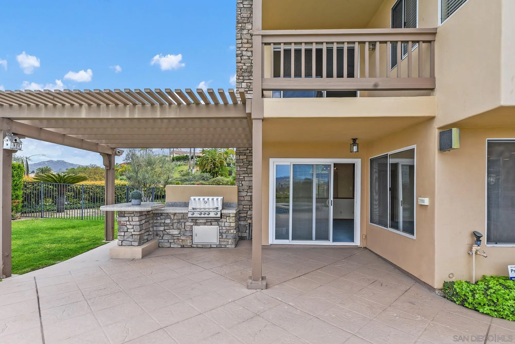 13000 Lomas Verdes Drive Poway, CA 92064 - Photo 50 of 58 a view of a house with backyard and porch